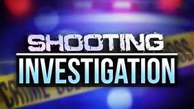 Police Investigate Halfway Tree Shooting.